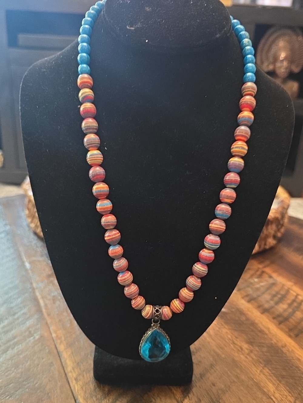 Multicolor Beaded Glass Necklace with Blue Teardrop Pendant